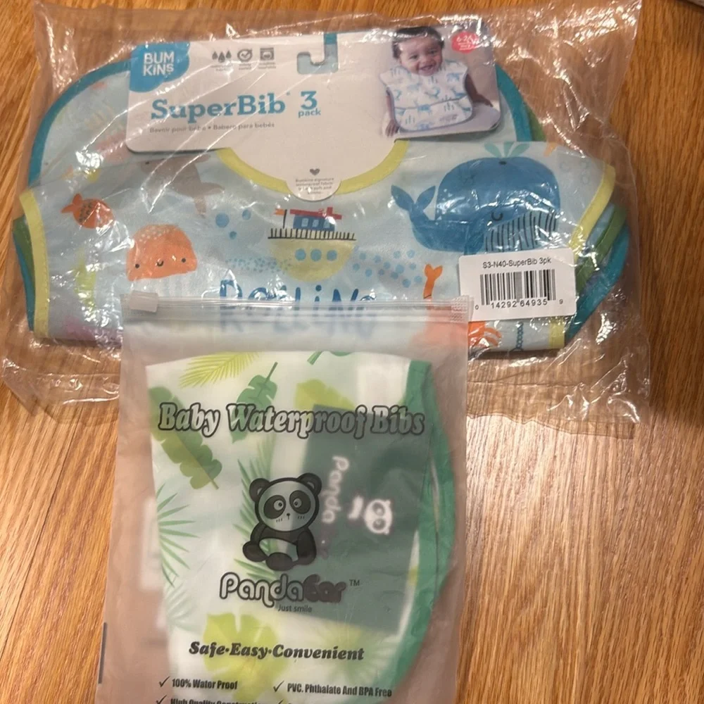 4 brand new bibs